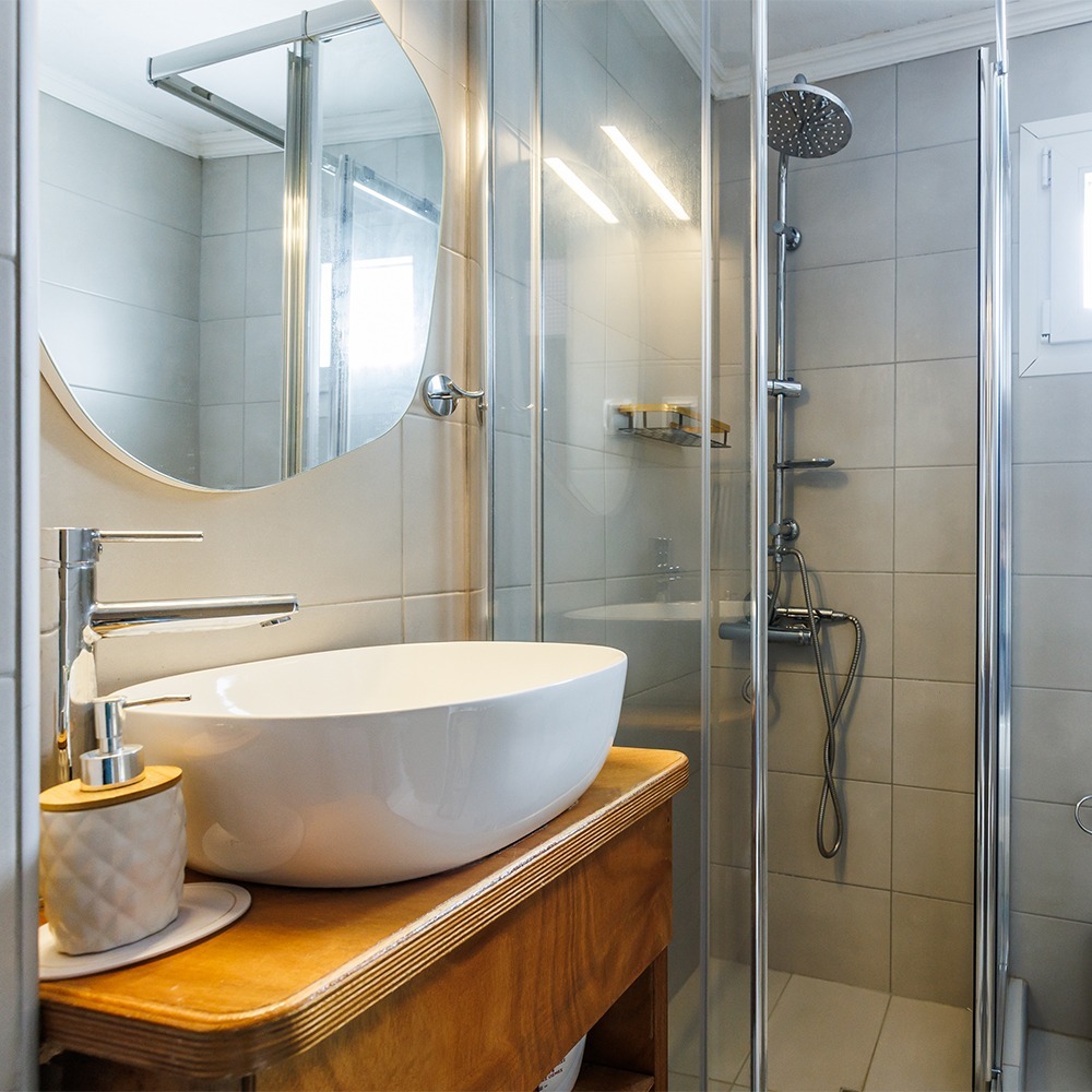 Christy's traditional house on Skopelos: Walk-in shower with tempered glass partition which keeps the area clean and dry.